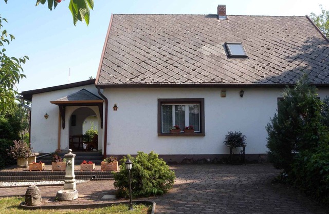 Casa vacacional con terraza techada y parrilla