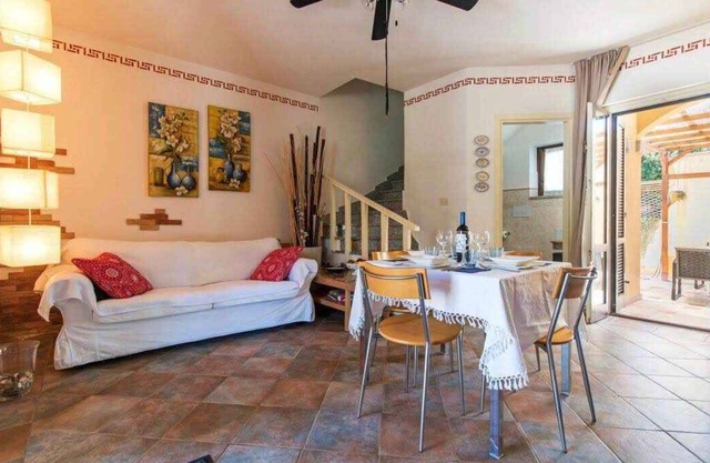 Holiday home with garden and air conditioning