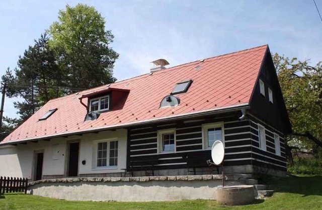 Casa vacacional con jardín y barbacoa