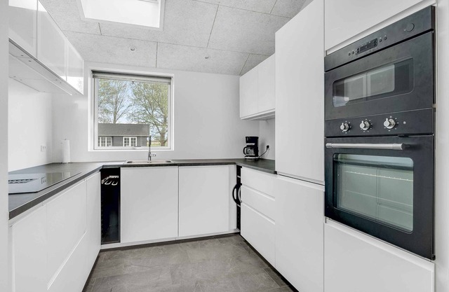 Holiday home with hot tub, sauna and activity room