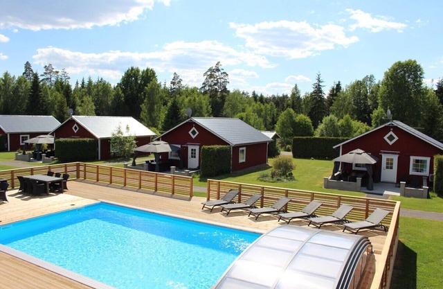 Holiday home with lake view, pool and boat in Småland