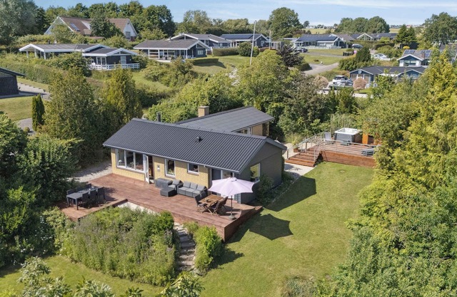 Holiday home with spa, sauna and sea view