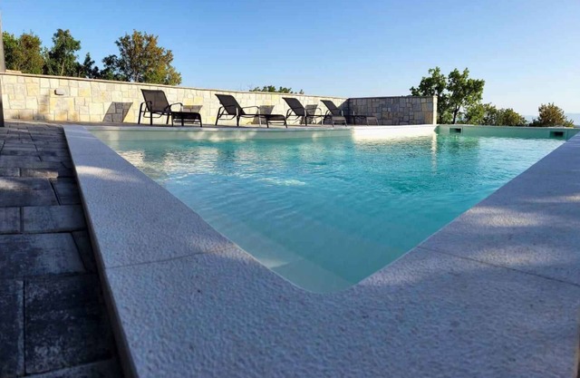 Holiday home with three bedrooms and pool