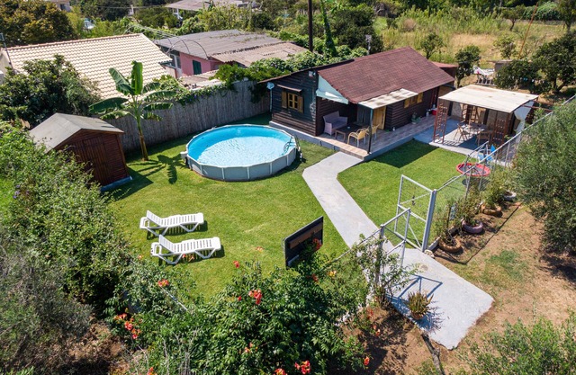 Casa de vacaciones 'Wooden House Corfu' con piscina, jardín, terraza y Wi-Fi