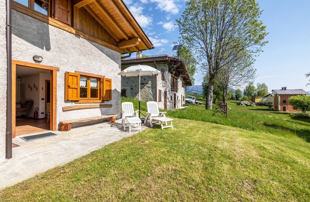 Casa de vacaciones 'Zia Mariota Zeller' con vistas a la montaña y jardín privado