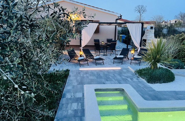 Casa de vacaciones Tesser con piscina