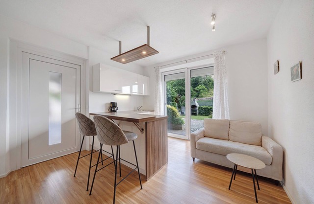 Apartamento vacacional "Mayenburg" con vistas a la montaña, jardín y piscina compartidos