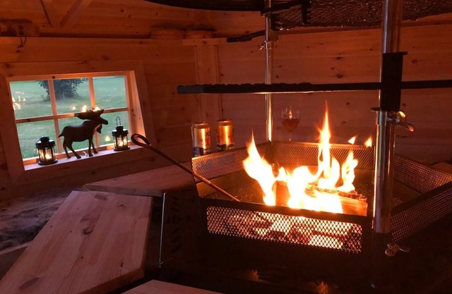 Holiday paradise on the lake with a boat and sauna