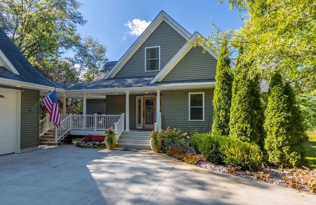 "Home Away From Home" nestled into five private acres on an all sports lake!