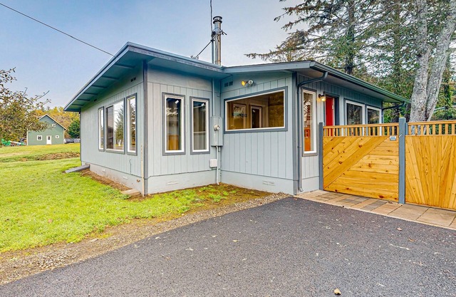 Home near the ocean with wood stove, large yard, washer/dryer, streaming, patio