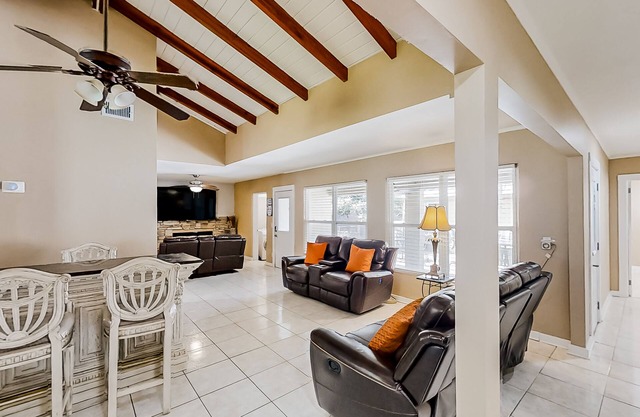 Home near the beach & golf with inviting patio, fireplace, AC, & washer/dryer