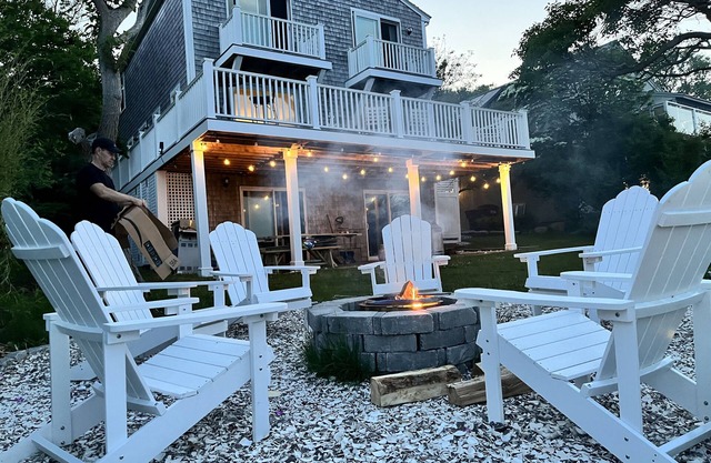 Home with spectacular panoramic ocean views from a bluff high above Cape Cod Bay