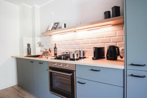 HOMEFY FEEL-GOOD APARTMENT - own parking, balcony and garden