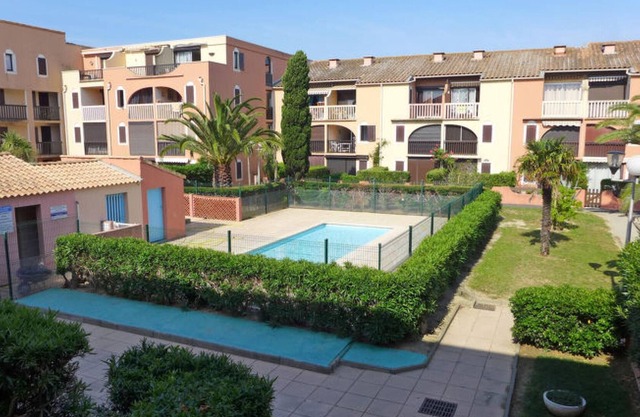 Homerez - Apartamento a 900 m de la playa para 4 pers. con piscina compartida