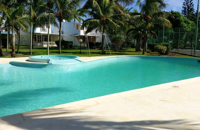 Homerez - Casa para 7 pers. con piscina compartida y jardín en Trou-aux-Biches