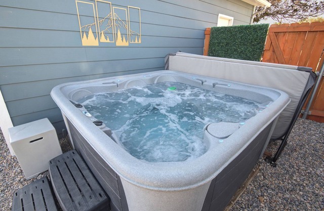 HOT TUB - Entire NEW Home - Walk to Light Rail - King Beds - Firepit Theatre