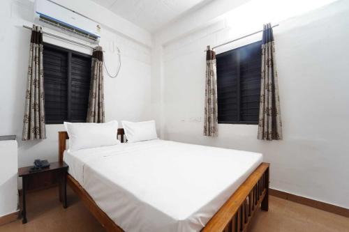Hotel O RS Puram North Railway Station RG Residency