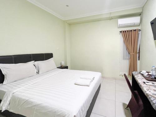 Hotel Permai Syariah Mitra RedDoorz