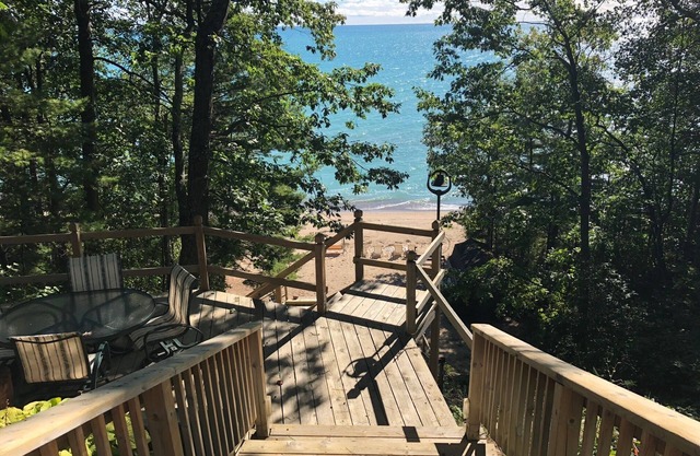 House is located on Lake Huron with a private beach