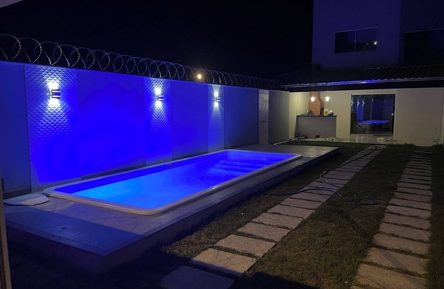 House just a few meters from Praia do Bosque with a beautiful pool and barbecue area
