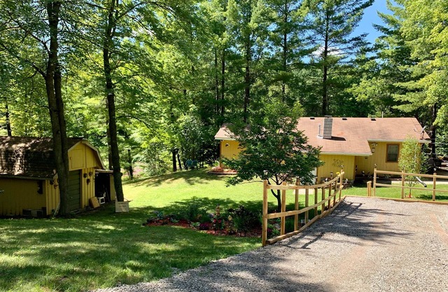 House on the edge of the Tittabawassee River