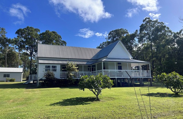 House Overlooking a Private 12 Acre Lake And Only 4 Minutes To The Beach
