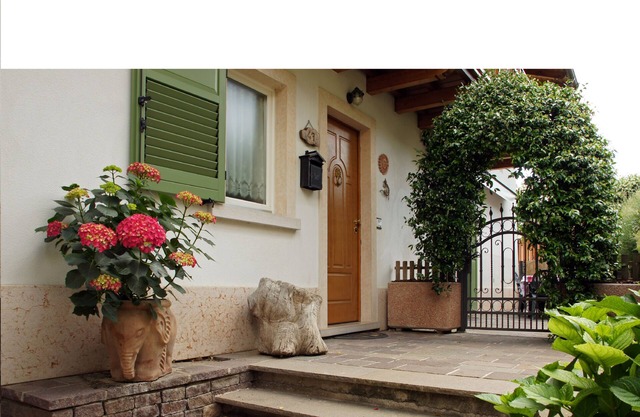 House with garden in the middle of the terraced vineyards of the Cembra Valley