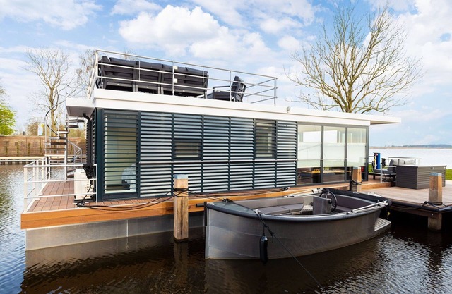 Casa flotante en el Sneekermeer y sus alrededores
