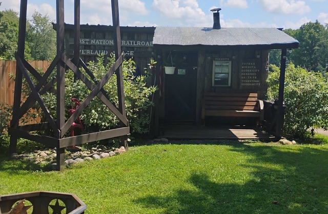 Hunting Cabin Rustic Handcrafted primitive sits in our unique rustic Cowboy Town