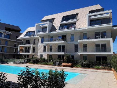 Huswell - Family-friendly apartment in Nieuwpoort with shared summer pool