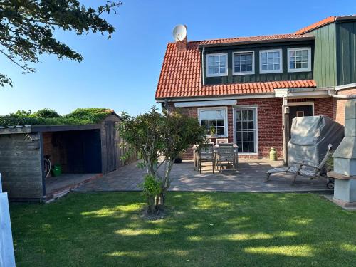 "Huus ant Diek", Ferienhaus mit Maisonette Wohnung in Deichnähe, Nähe Norddeich