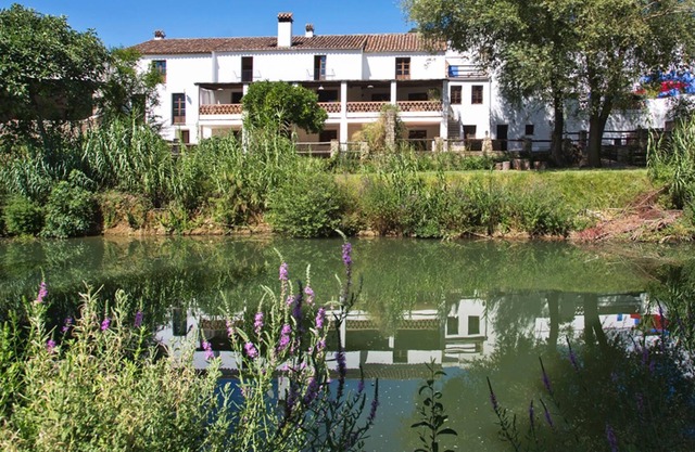 Idyllic Riverside Village Mansion house with private pool.