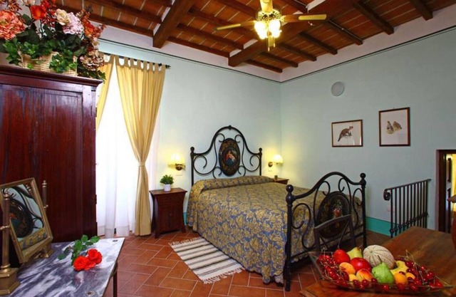 In the Tuscan Maremma, village center, with gardens suspended between heaven and earth