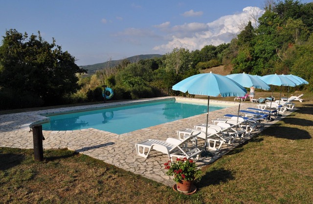 Cabaña panorámica independiente en granja activa con piscina compartida Toscana Siena