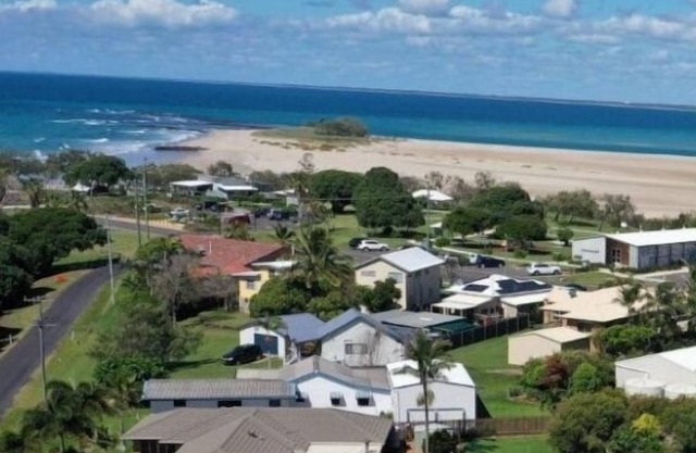 Indoor/outdoor pet-friendly beach house next to world-class beach and river.