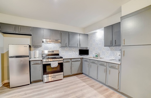 Inviting home with heated pool, enclosed yard, central AC, & W/D - dog-friendly