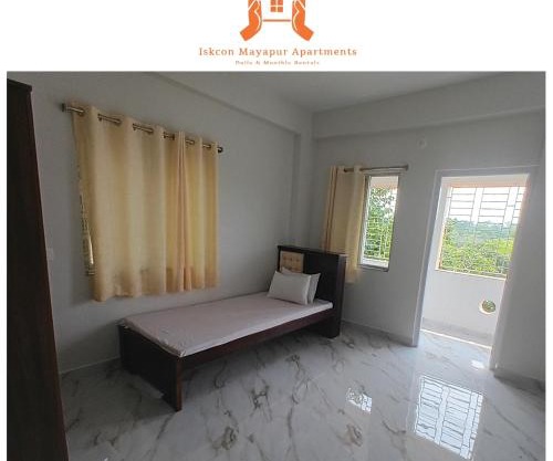ISKCON Mayapur Apartments - Daily & Monthly Rentals - One Bedroom SERVICED Apartment, 5 MINUTE TOTO RIDE to MAIN ISKCON TEMPLE