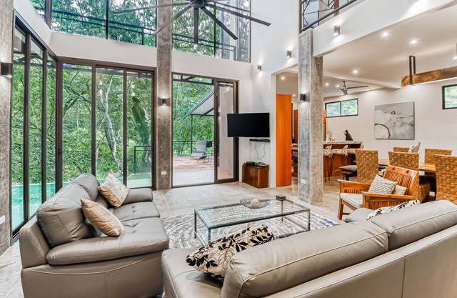 Jungle-view house with infinity pool, balcony, & lanai - snowbird-friendly