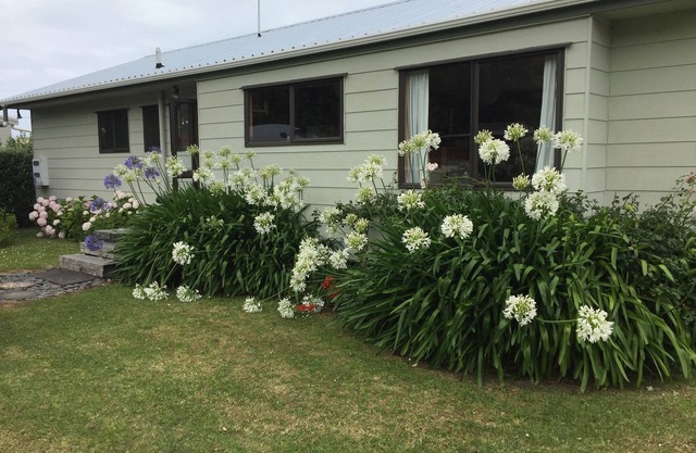 Karo Cottage, Taylors Bay: cómodo y acogedor para sus próximas vacaciones en la playa.