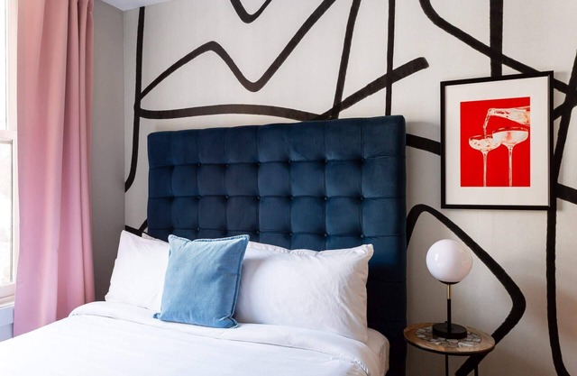 Kasa | Cozy space with funky decor + in-unit Keurig | Charlotte