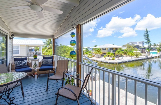 Key Blessing: Experience the Keys Life at This Charming 3BR Canal Front Home, Dockage & Dog-Friendly
