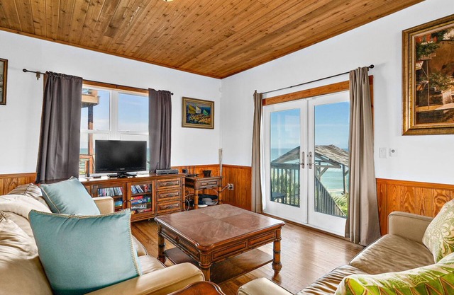 Key West-style oceanfront home with breathtaking views & beach access