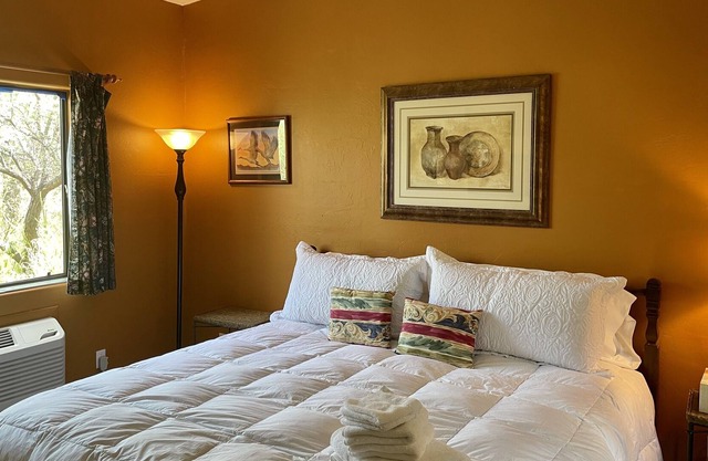 King bed room in a beautiful, well-established country inn on 14 forested acres.