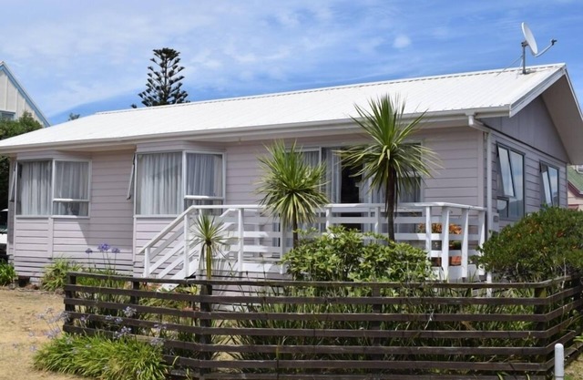 Escapada de kiwi en la playa de Waihi - relajarse andamp; relajarse