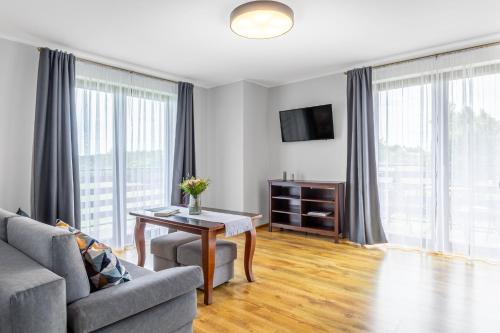 Komfort i spokój blisko natury - Apartamenty i pokoje ARKO