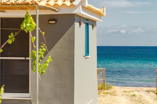 Koroni Beachfront Retreat, Private Garden Haven