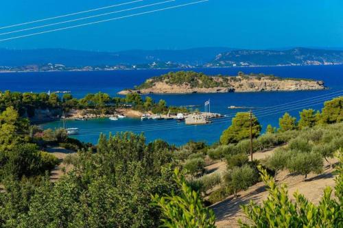 KOUNOUPISEA Holidays house ΜΕ ΥΠΕΡΟΧΗ ΘΕΑ ΣΤΟ ΠΟΡΤΟ ΧΕΛΙ