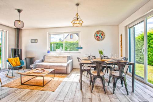 L'effet mer Maison rénovée lumineuse tout confort belle terrasse grand jardin clos sans vis à vis parking jeux pour enfants 5 mn à pied de la plage d'Asnelles et centre bourg - proche Bayeux au coeur des plages du débarquement