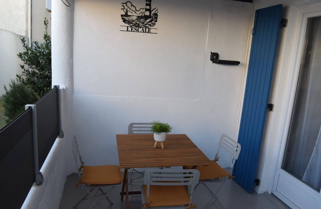 L' Escale, appartement climatisé à 50 mètres de la plage avec WIFI et Box Tv