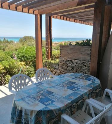 La Finestra su Stintino 5 Appartamento con veranda vista mare e piscina